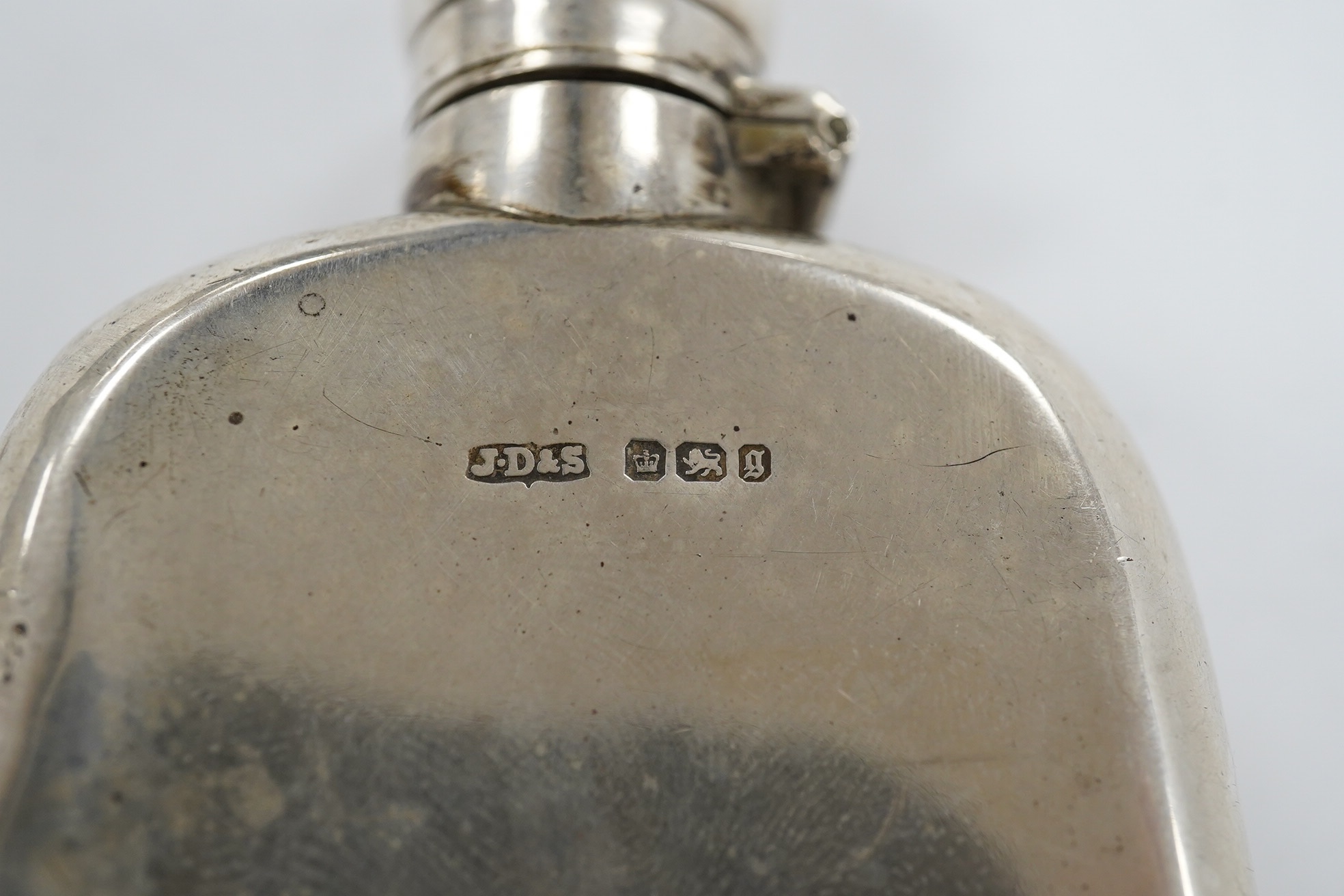 A late Victorian silver hip flask, by James Dixon & Sons, Sheffield, 13.3cm, 5.3oz. Condition - poor